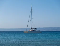 sailing boat catamaran anchored at rippled sea la 2024 12 07 22 07 06 utc