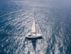 sailing boat with white sails rippled sea backgro 2024 12 07 22 31 07 utc